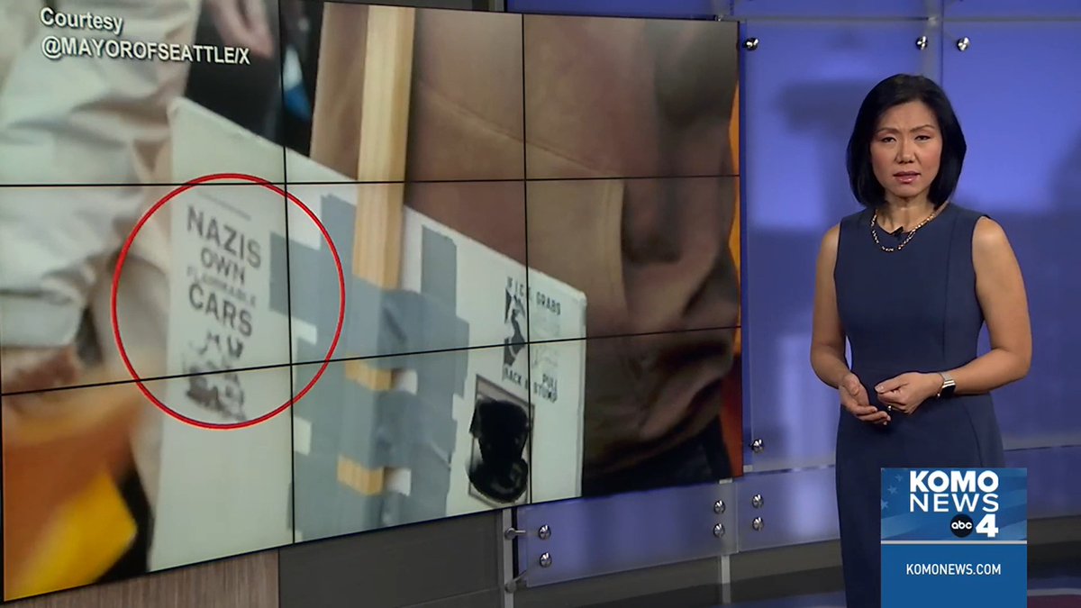 A post on Seattle Mayor Katie Wilson’s X account over the weekend is drawing criticism from some political analysts. It shows the mayor at an anti-ICE rally posing for a photo with two people, one of whom was holding a sign with a small sticker in the corner that said, “Nazis own flammable cars.” The mayor’s office responded to questions about the post Monday. #komonews #seattle