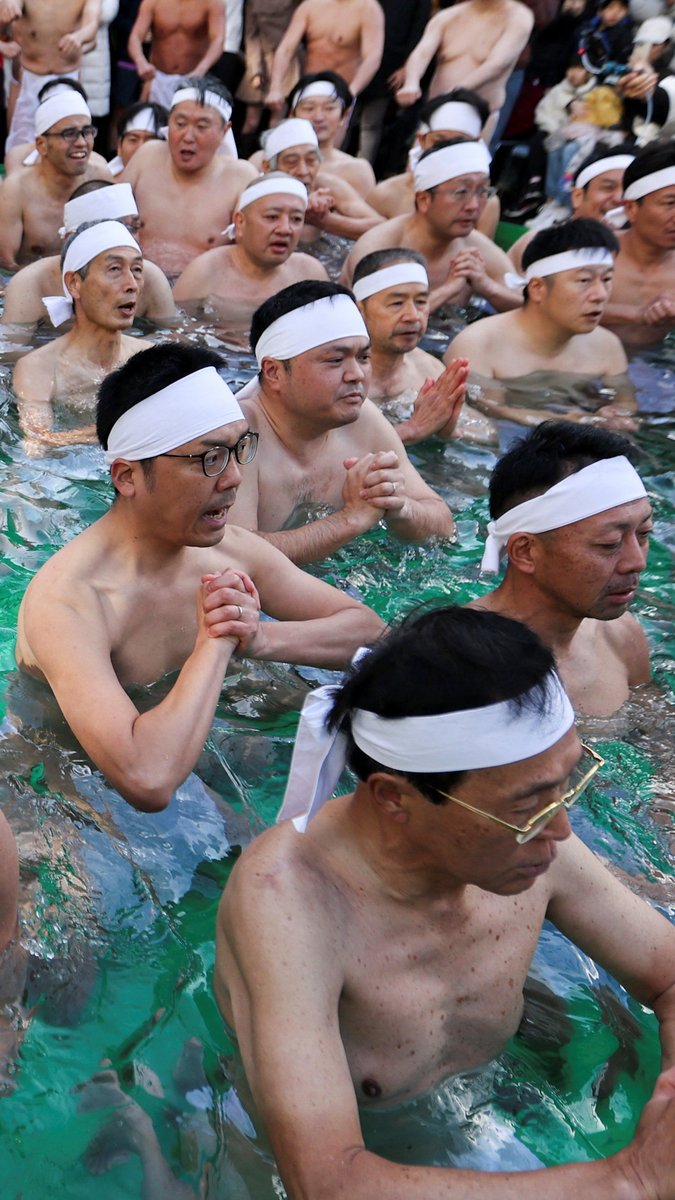 Japanese worshippers take an icy plunge at a Tokyo shrine to pray for the new year and purify souls. The ritual has been held since 1955.