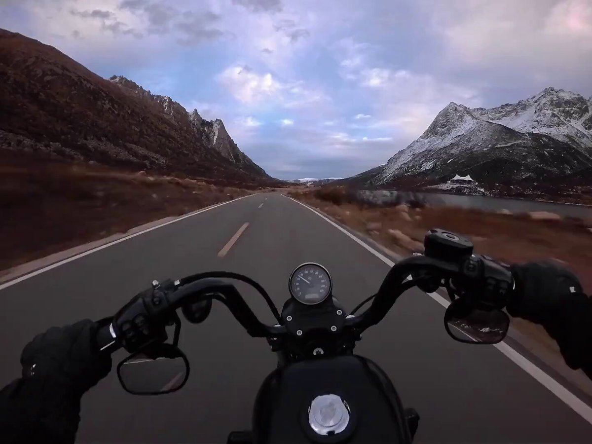 Biking thought Tibet in winter. The grasslands turns brown but snow is also plentiful