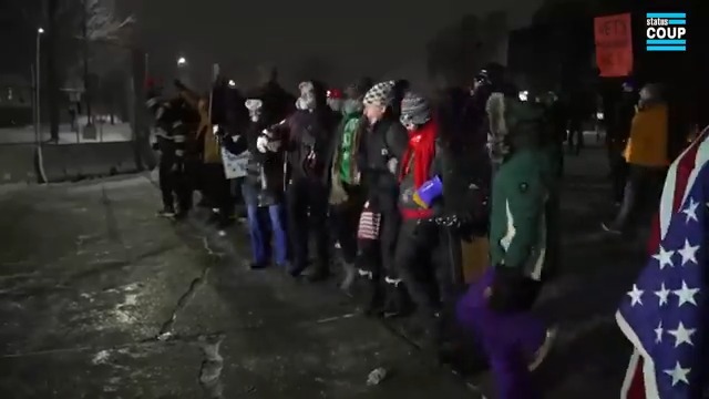 With arms linked and snow falling, Minneapolis ICE protesters dance as ICE agents retreat back. "Nah nah nah, hey hey hey, goodbye!" WATCH ⬇️