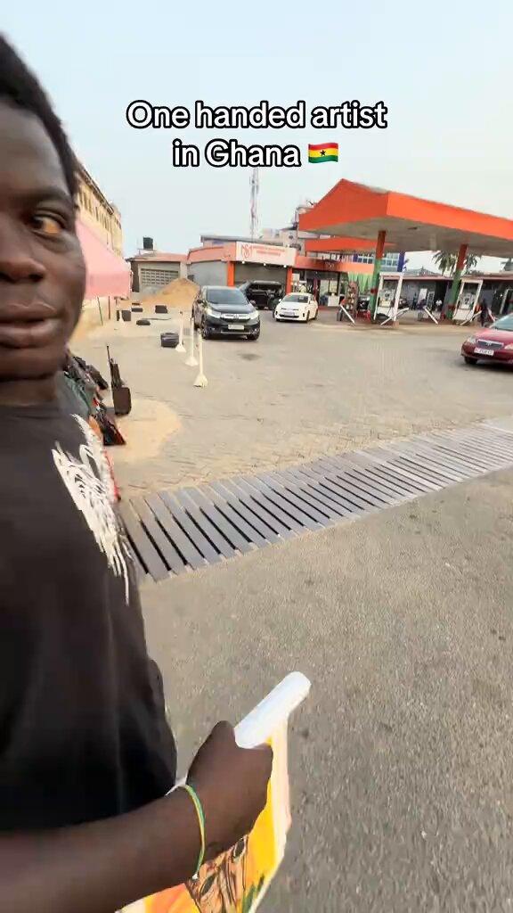 Talented Ghanaian street artist and hustler showcases a selection of self-painted art pieces, demonstrating remarkable skill and resilience despite being an amputee.