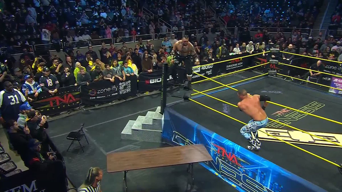 .Mike SANTANA🇵🇷 just got caught with a Cutter from 👑 Frankie Kazarian 👑 THROUGH A TABLE! Watch #TNAGenesis LIVE on TNA+: