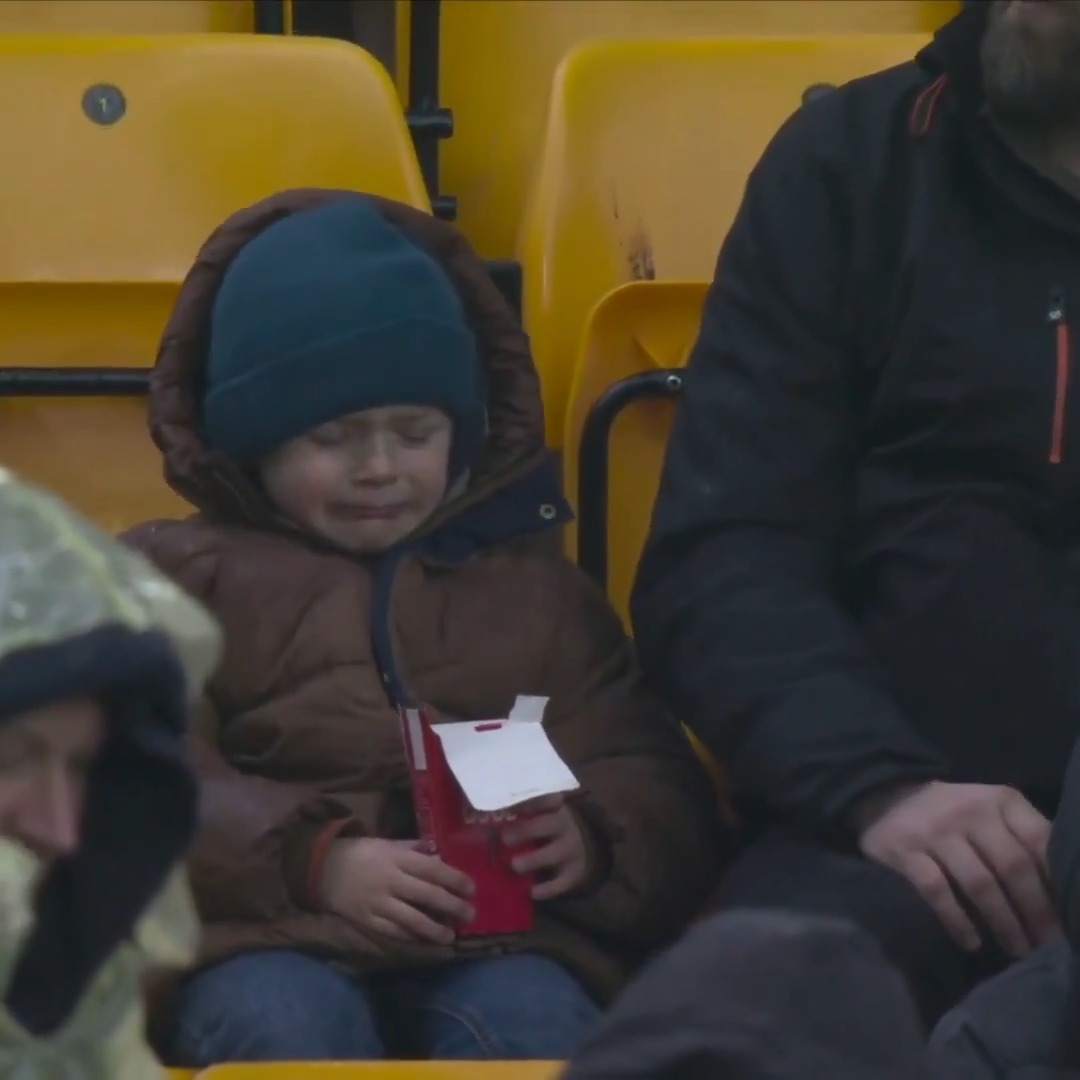 This young footy fan was devastated after being robbed of his chicken nugget. Gutting scenes.