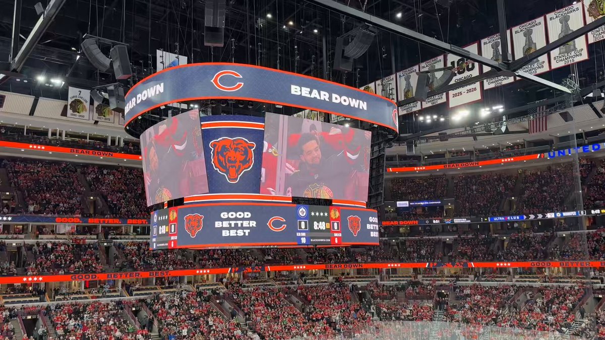 Crowd FIRED UP to see Caleb Williams on the glass at the #Blackhawks game tonight