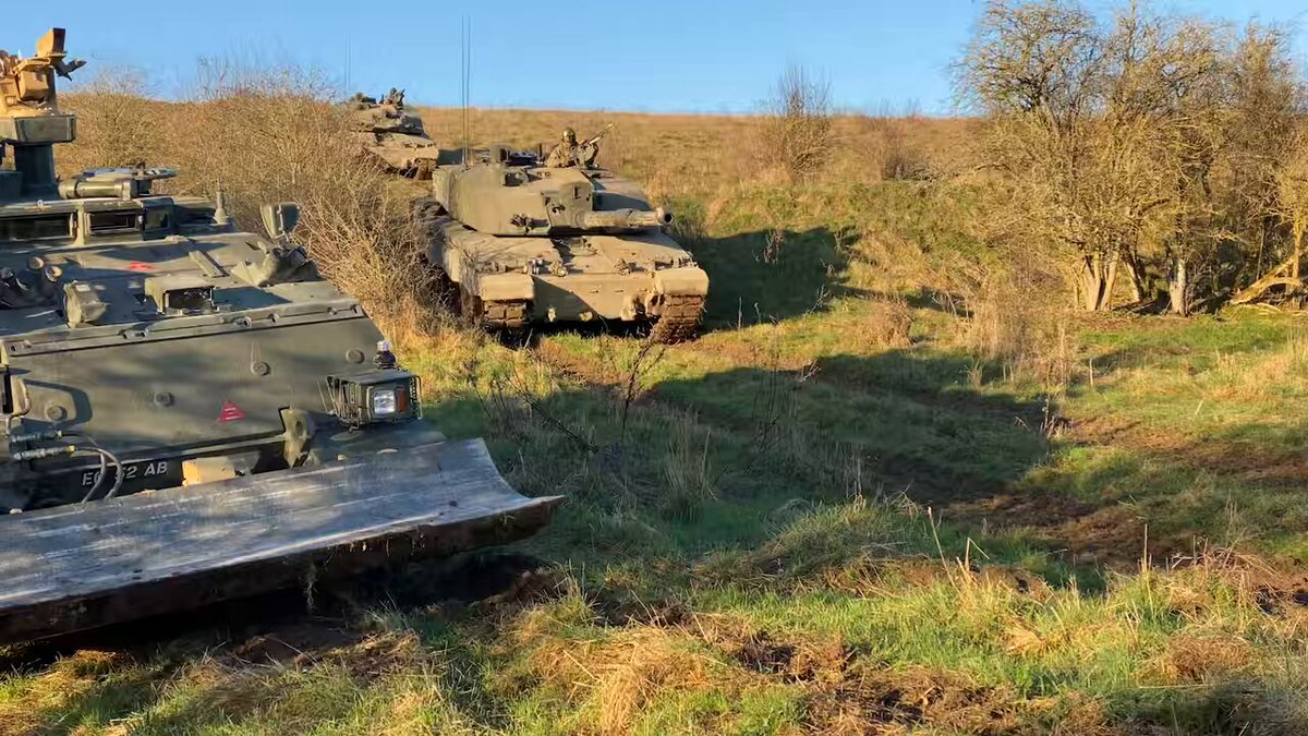 Trojan, an armoured engineer vehicle designed to open routes through complex battlefield obstacles and clear a path through minefields, places a pipe fascine bundle over an obstacle. This enabled troops on an Armoured Commanders Course to manoeuvre their Challenger 2 tanks