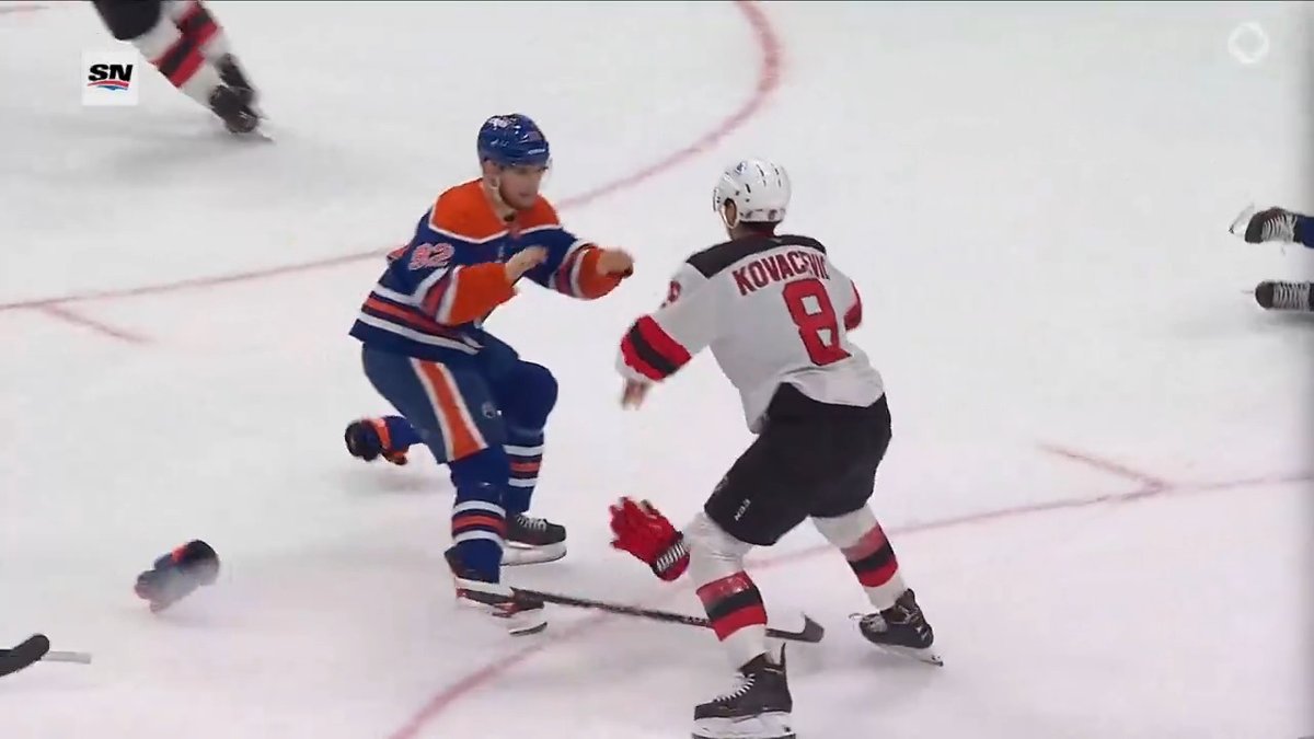 Johnathan Kovacevic rocked Connor McDavid, and Vasily Podkolzin wasted NO time defending his captain 😳👊