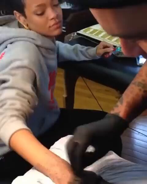 rihanna getting a stick and poke tattoo in new zealand (2013)