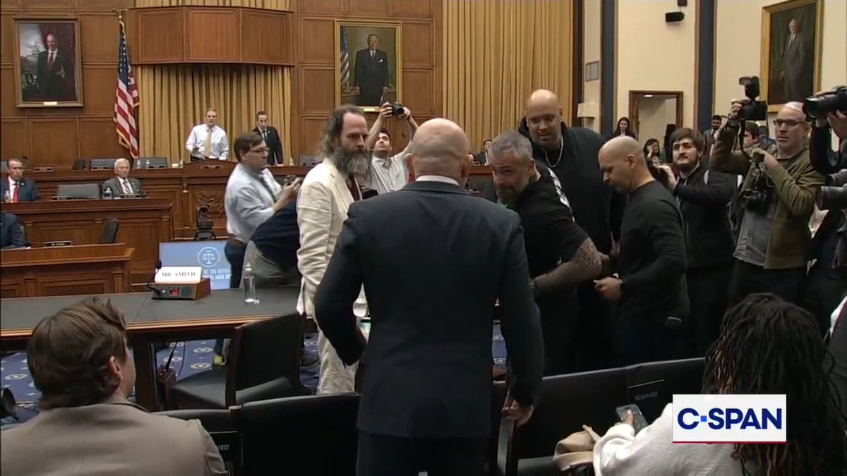 Confrontation between former Capitol Police Officer Michael Fanone and Ivan Raiklin during a recess in the House Judiciary Cmte. Jack Smith hearing.