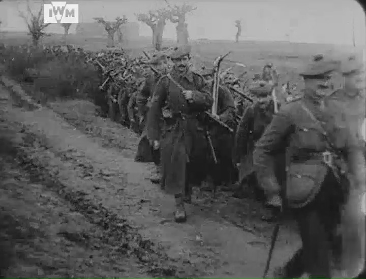 British soldiers filmed on the Salonika Front with trench-digging gear, possibly mid-1916. Film: IWM 1062-22b <1/2>