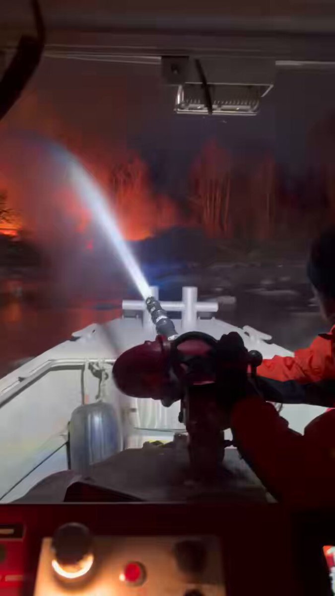 View from the Fireboat during operations at the woods fire near Fletchers boathouse. #DCsBravest