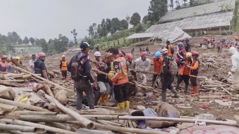 Indonesian authorities resumed their search for 80 missing people after a landslide killed at least 10 in West Java province