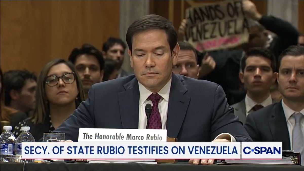 Sen. Risch to protester at hearing with Secretary Marco Rubio: "Here we go...You know the drill. Off to jail."