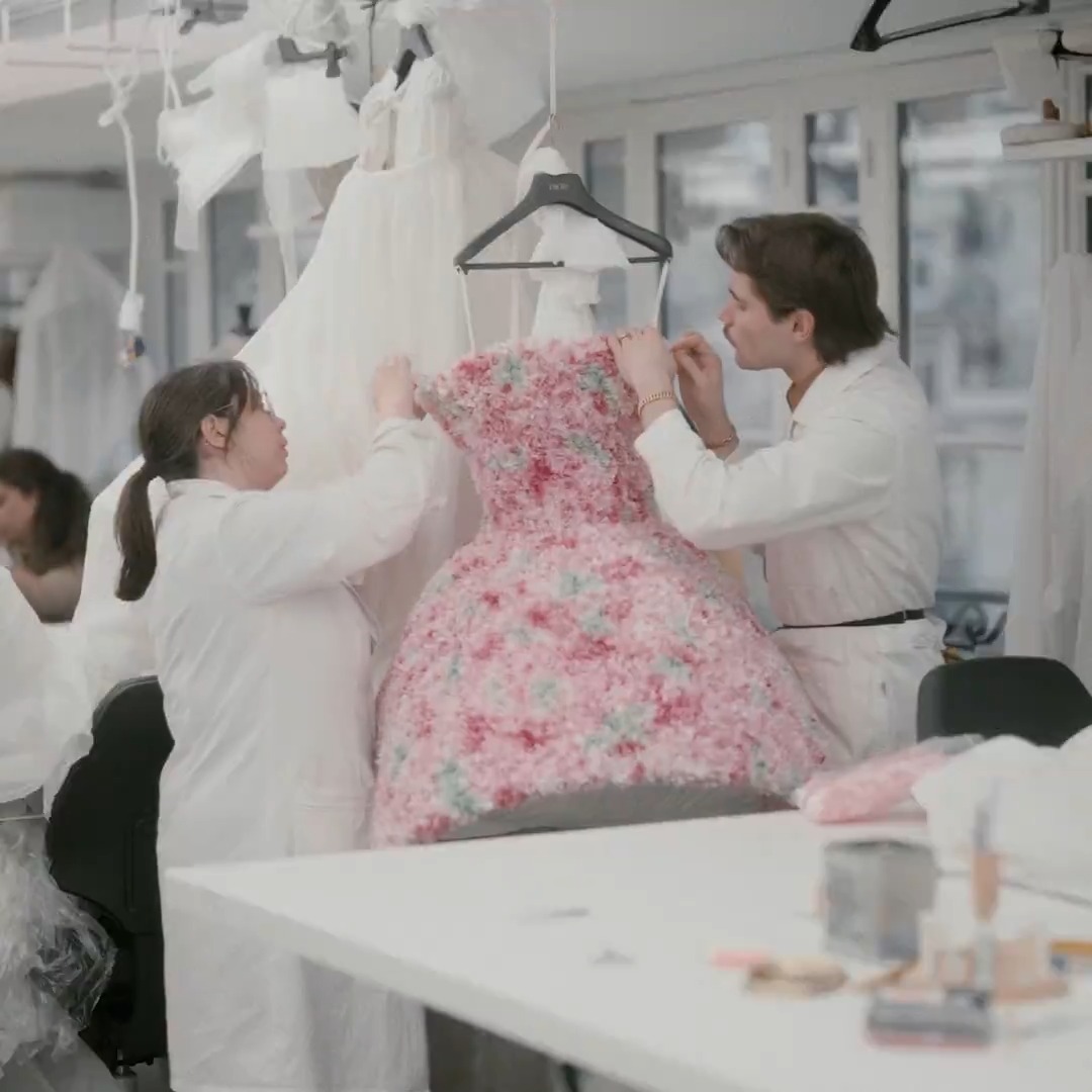 Dior Spring Summer 2026 Haute Couture. Cyclamen flowers, symbolic for Creative Director Jonathan Anderson, were individually cut out in silk, dyed and embroidered by hand on a dress, skirts, shoes and the headpieces that appeared across the collection. #DiorCouture