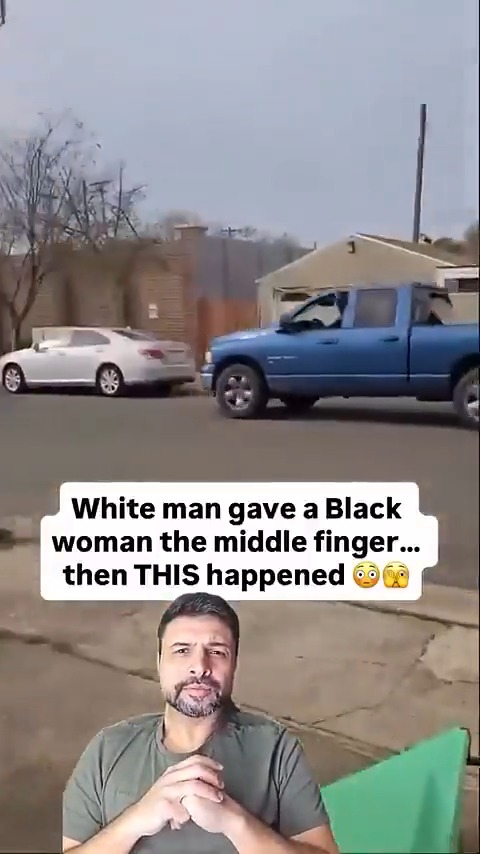 A white man driving a pickup truck decided to give a Black woman filming him the middle finger. Unfortunately for him, he missed the part where the road kept existing, he then crashed somewhere in a quiet neighborhood.
