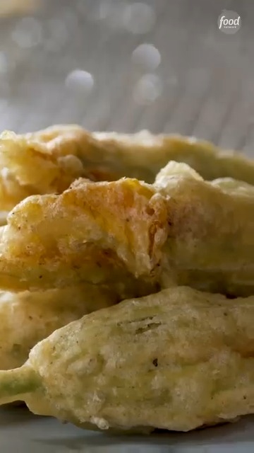 Chef Tiffany Derry reinvents traditional boudin by using squash blossoms in place of the usual casing 🙌 Plus, they're stuffed with smoked mozzarella and fried in a light tempura batter for the perfect crunch. Don't miss a NEW episode of #WorstCooks with Tiffany Derry Sunday at 8|7c! Get the recipe: