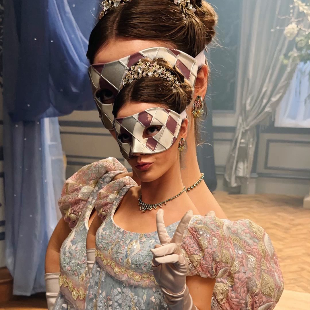 Do confess, whose attire has captured your admiration?