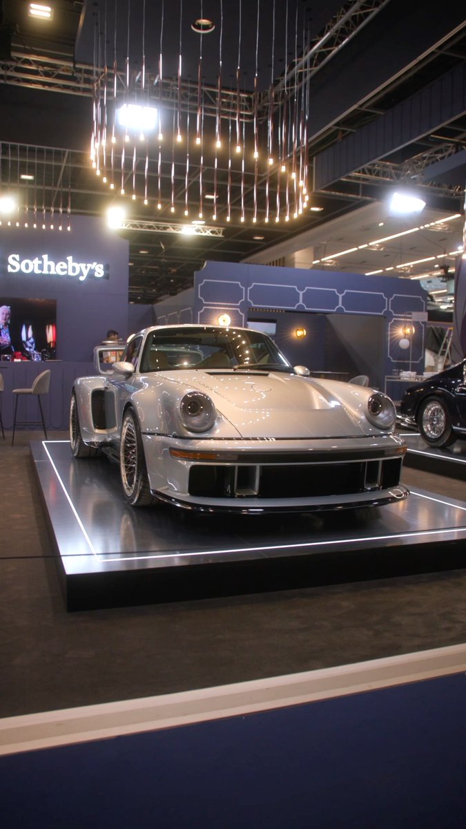 The ultimate 911, reimagined. Offered here is “The Sepang Commission,” one of just 99 DLS Turbo restorations. Originally a 1990 type-964 Porsche 911, it has been meticulously restored through Singer’s DLS Turbo Services, combining 710 bhp, twin turbocharging, and bespoke Wolf Blue carbon fibre bodywork. The car is presented with both track- and road-focused configurations, allowing the new owner to choose between ultimate aerodynamic performance or refined road-going elegance. Every detail reflects Singer’s philosophy of “Everything is Important,” from champagne anodised brightwork to Bone leather interiors with Dark Blue-tinted carbon fibre accents. This is a rare opportunity to acquire one of the most ambitious and visually striking examples of Porsche 911 Reimagined by Singer. Bidding opens Wednesday, 18 March 2026. Register to bid via #RMSothebys #RMSealed #Singer #Porsche911
