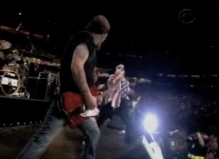 Unearthed footage of Kid Rock defiling an American flag goes viral days before his appearance at Turning Point USA's halftime show.