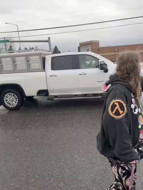 Another man appears to have approached high school-aged protesters from his truck before being quickly turned away.