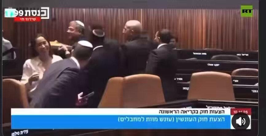 Look at them! As the Israeli Parliament, the Knesset, approves a bill to execute Palestinian prisoners, Ben Gvir beams with joy at the idea of killing more people without due process and even hands out sweets to celebrate!