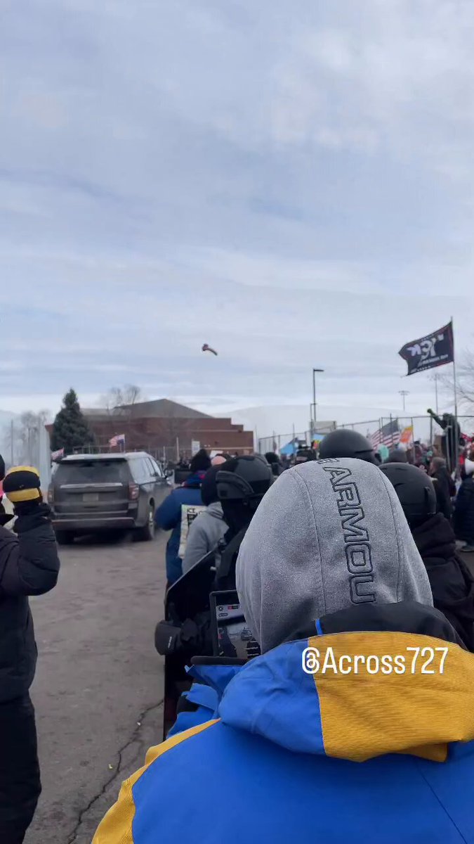ICE agents stand guard outside a federal building, as protesters line the street and throw dildos at ICE vehicles driving past Why are they so obsessed with dildos?