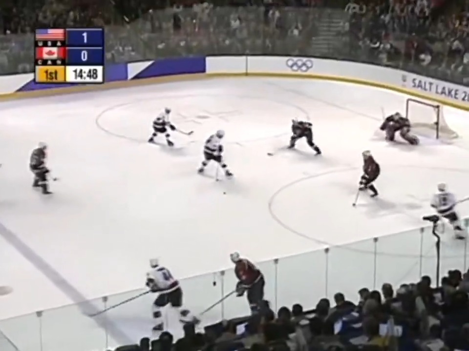 Mario Lemieux styling on the Americans at the 2002 Olympics, faked receiving Chris Pronger's pass, allowing Paul Kariya to tie the game. Insane goal.