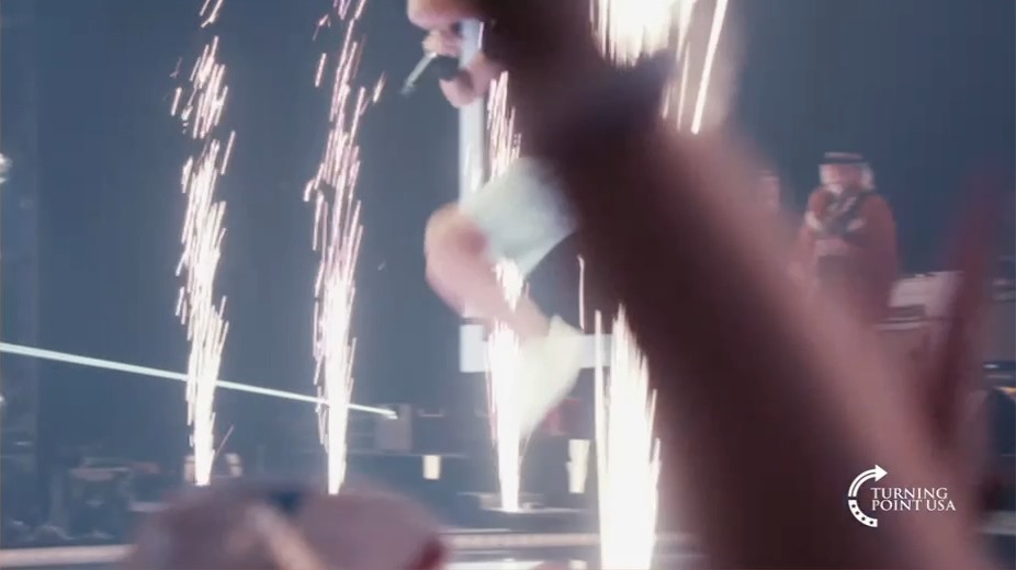 Kid Rock frolics and skips onstage during the Turning Point USA halftime show.
