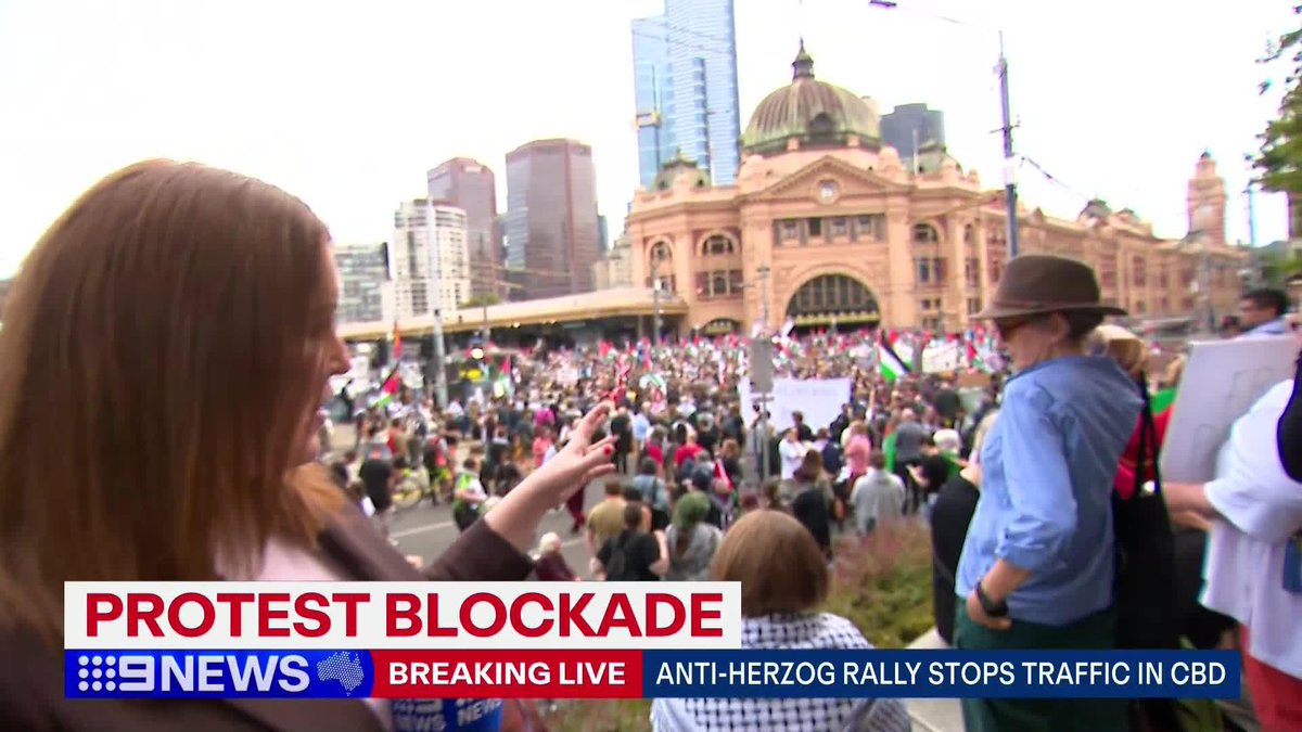 #BREAKING: Thousands of demonstrators are blocking a major city intersection, stopping trams and peak hour traffic. They're protesting the visit of Israeli President Isaac Herzog, who is due in Melbourne later this week. Steph Anderson #9News
