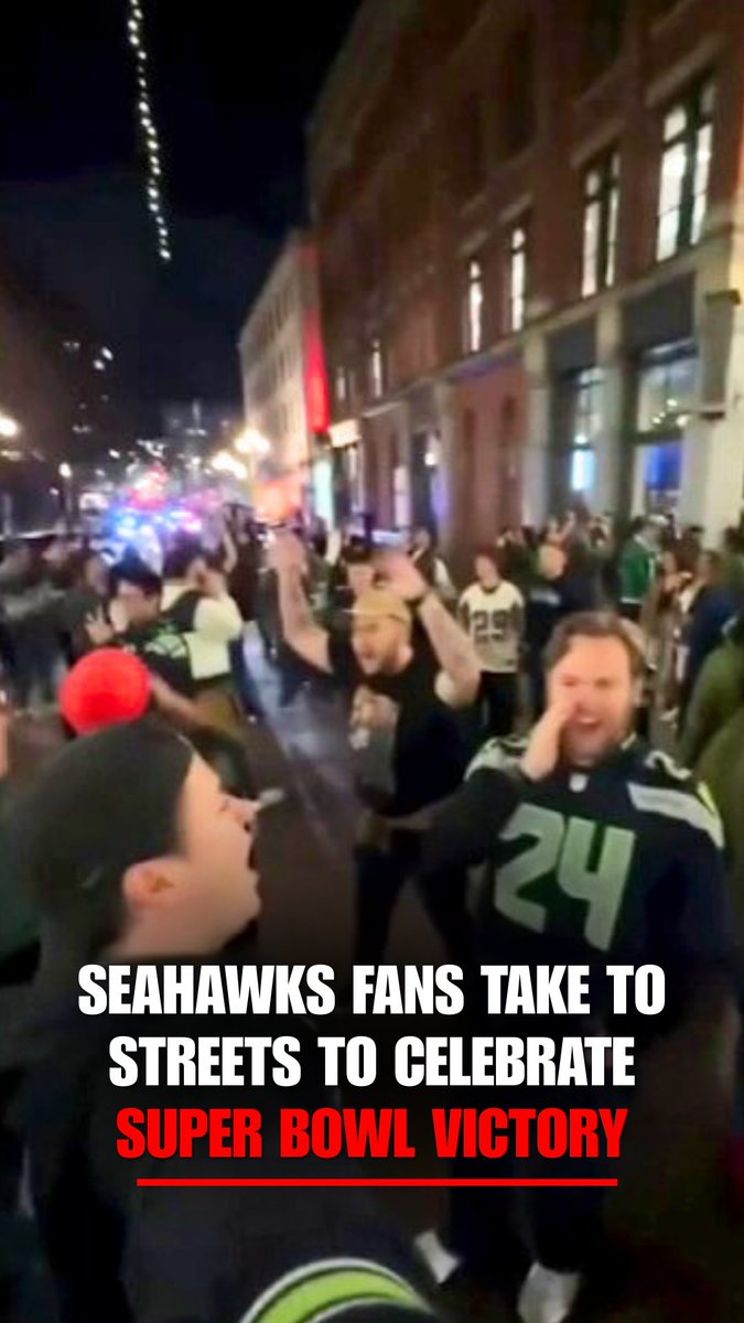 SWEET VICTORY: Seahawks fans pour into Seattle streets to celebrate the team's Super Bowl win over the Patriots.