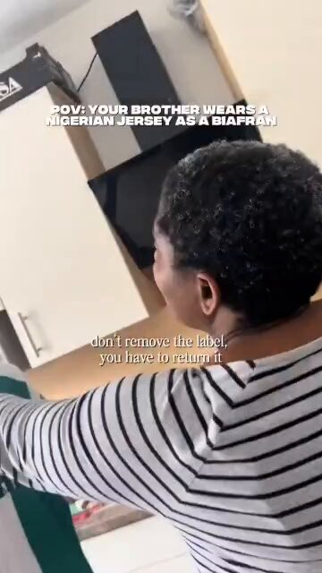 Moment abroad based Nigerian mother confronts her son for wearing a Nigerian football jersey rather than a Biafra jersey.