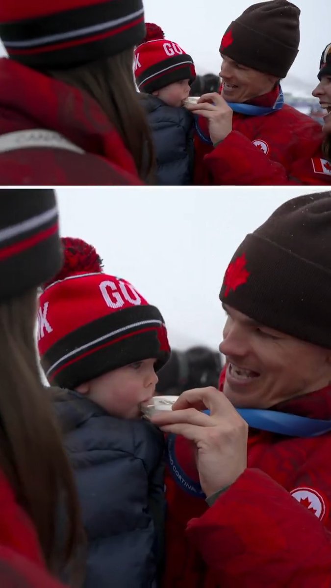 Baby Henrik biting dad's silver medal 🥹🥈