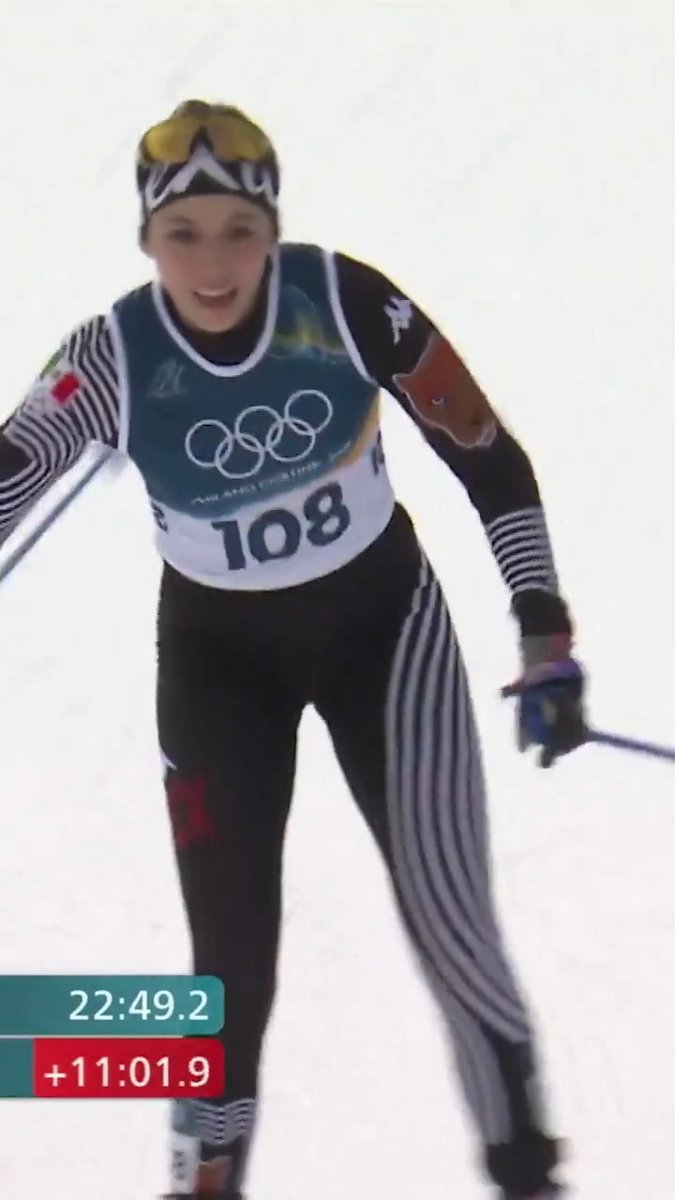 Regina Martinez, the first Mexican woman to ever compete in cross-country skiing at the #WinterOlympics, crosses the finish line to warm congratulations from the crowd and fellow competitors. 🇲🇽🎿