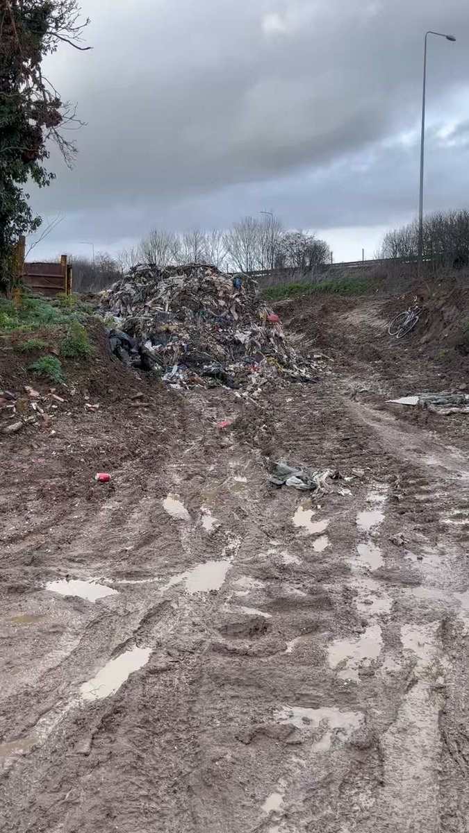 The scourge of illegal waste crime sweeping the country has now made its way to my river, with one of the largest illegal waste dumps in the country being discovered next to the River Roding at Stapleford Tawney, near Epping. Nobody knows what exactly is dumped on this 20,000 square metre site, or how much waste it contains, but it is certainly tens of thousands of tonnes. Shockingly, rubbish has been dumped on this site since 2024 and the Environment Agency (EA) has known about it for *at least* a year. Even now, however, the EA has not shut down the site by obtaining a legal closure order, physically blocking off the site and putting in CCTV monitoring. This means the site is wide open so anyone can continue to dump there. There is also zero monitoring of the environmental impact on the river, despite visible toxic leachate pooling on the surface of the dump & draining off it. The EA has apparently no plans to remove the waste from this site either & intends to let it pollute the environment indefinitely.