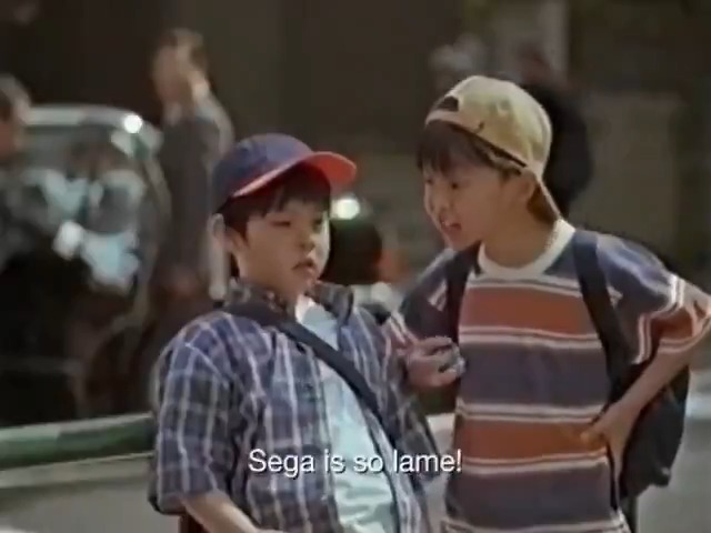 Sega's 1990s managing director Hidekazu Yukawa appeared in a series of TV advertisements for the Dreamcast. In this one he has nightmares about Sony's PlayStation being cooler than Sega. Presented with subtitles.