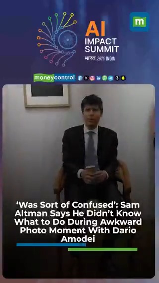 #WATCH | 📸 ‘Was Sort of Confused’: Sam Altman Says He Didn’t Know What to Do During Awkward Photo Moment With Dario Amodei At the #IndiaAIImpactSummit2026 in Delhi, OpenAI CEO Sam Altman told Moneycontrol he was “sort of confused” during an awkward group photo moment with Anthropic’s Dario Amodei when Prime Minister Modi raised his hand — saying he wasn’t sure what he was supposed to be doing. Altman and Amodei, who lead rival AI firms, briefly hesitated in the photo-op. #AISummit #OpenAI #Anthropic #SamAltman #DarioAmodei | Chandra R. Srikanth