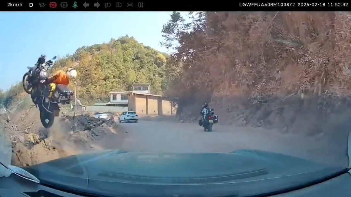 A woman riding a motorcylcle lost control on a mountain road in Zhenyuan County, China. According to local news reports - she was not injured and was able to walk away from the crash. Let go of the throttle accordingly... 🏍️ #rural #diversity #china #motorcycle #women #19th #empowerment #GirlBoss #fail #FAFO #osha #safety