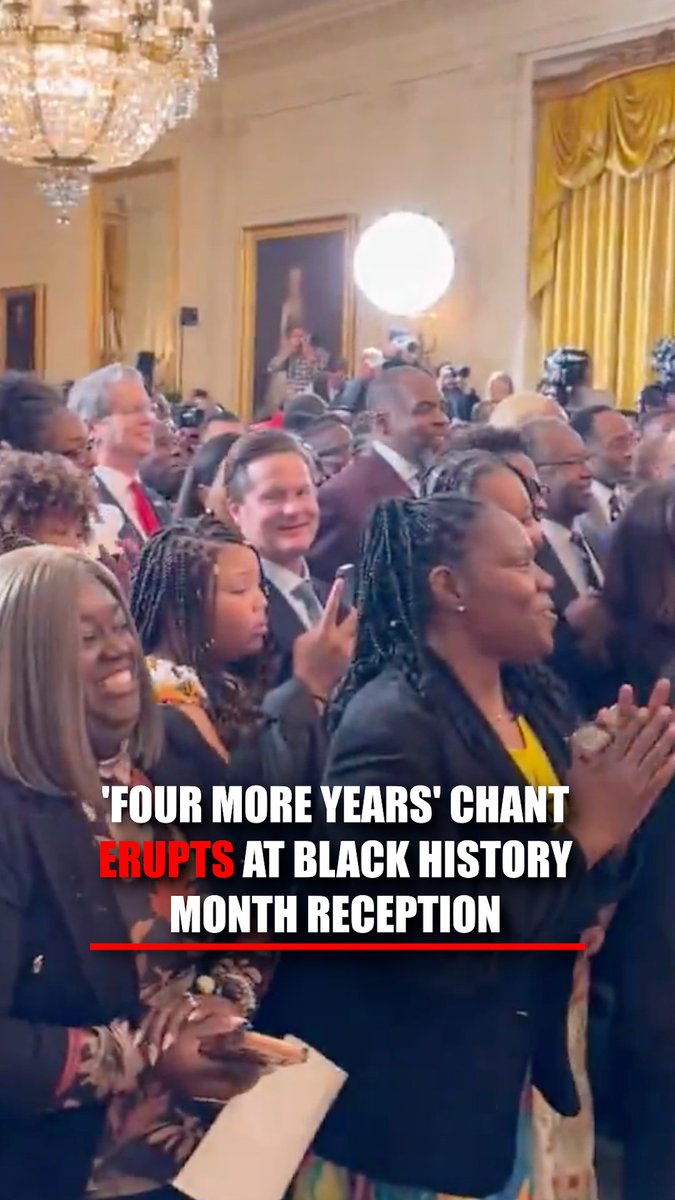 'FOUR MORE YEARS': Cheers erupt at a Black History Month reception as attendees chant while President Trump takes the stage. Margo Martin