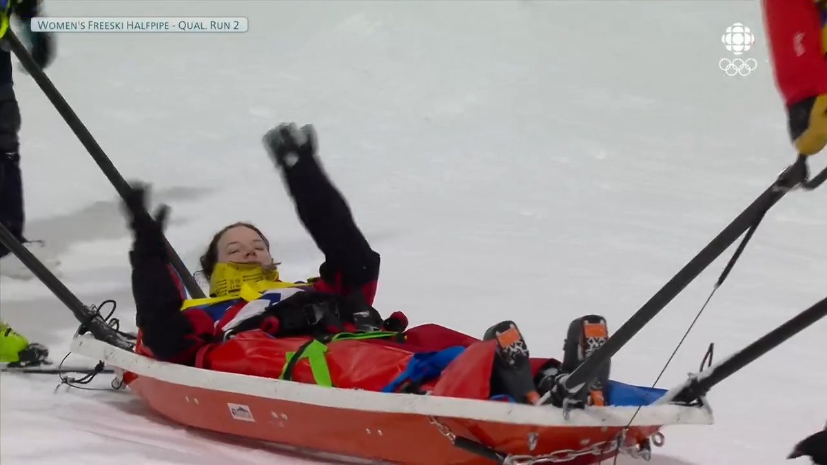Canada's Cassie Sharpe took a scary spill in the halfpipe qualifiers and had to be sledded off She waves to the crowd and her family as she leaves