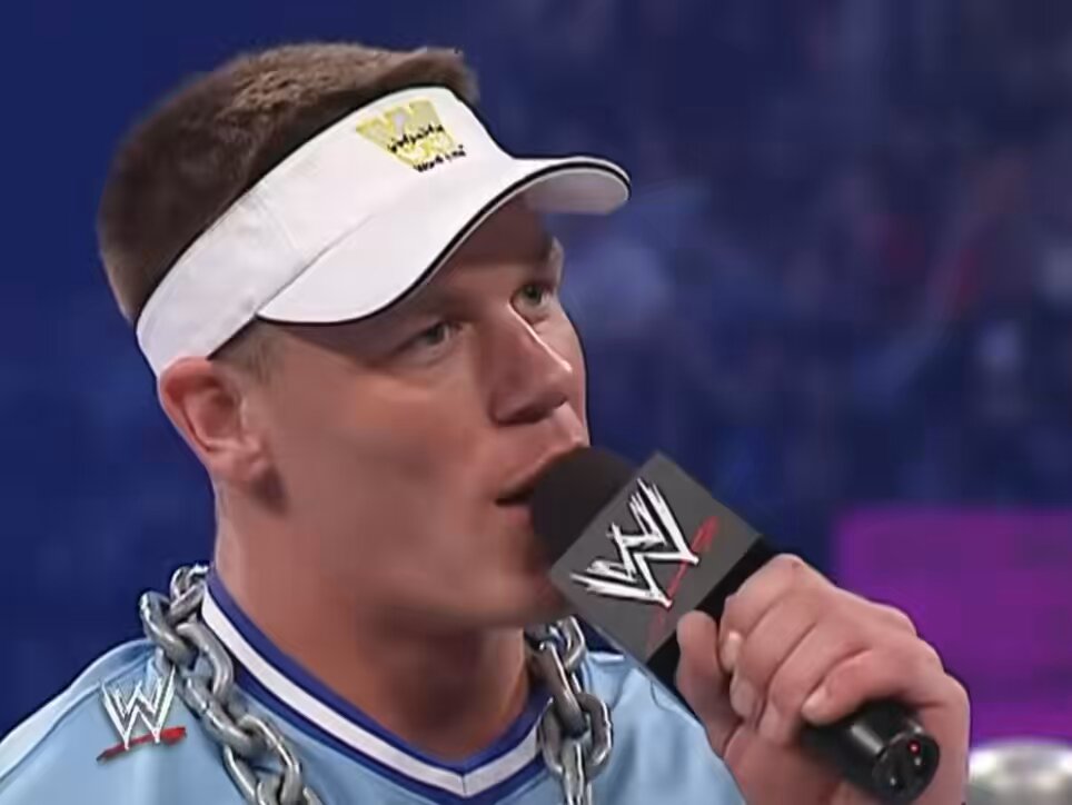 John Cena impersonates Booker T for almost 3 minutes. I’d imagine Vince was in the back pissing himself watching this.