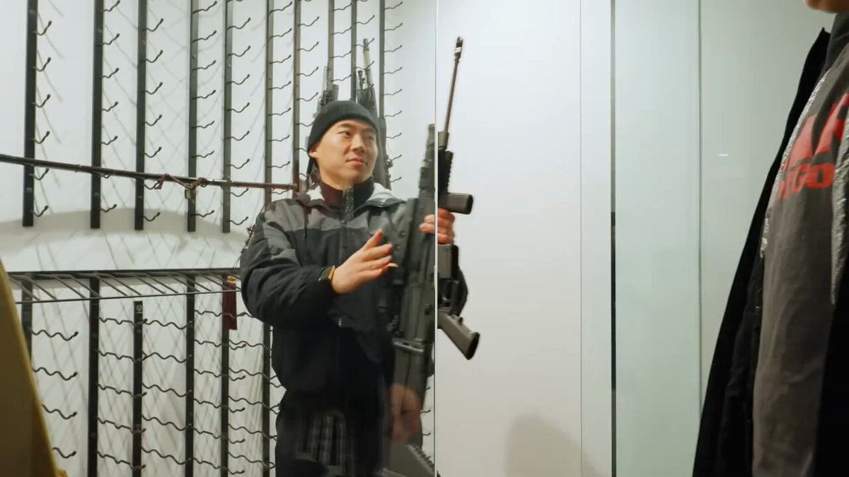 Brian Jung shows Orangie a real life SCAR from FORTNITE