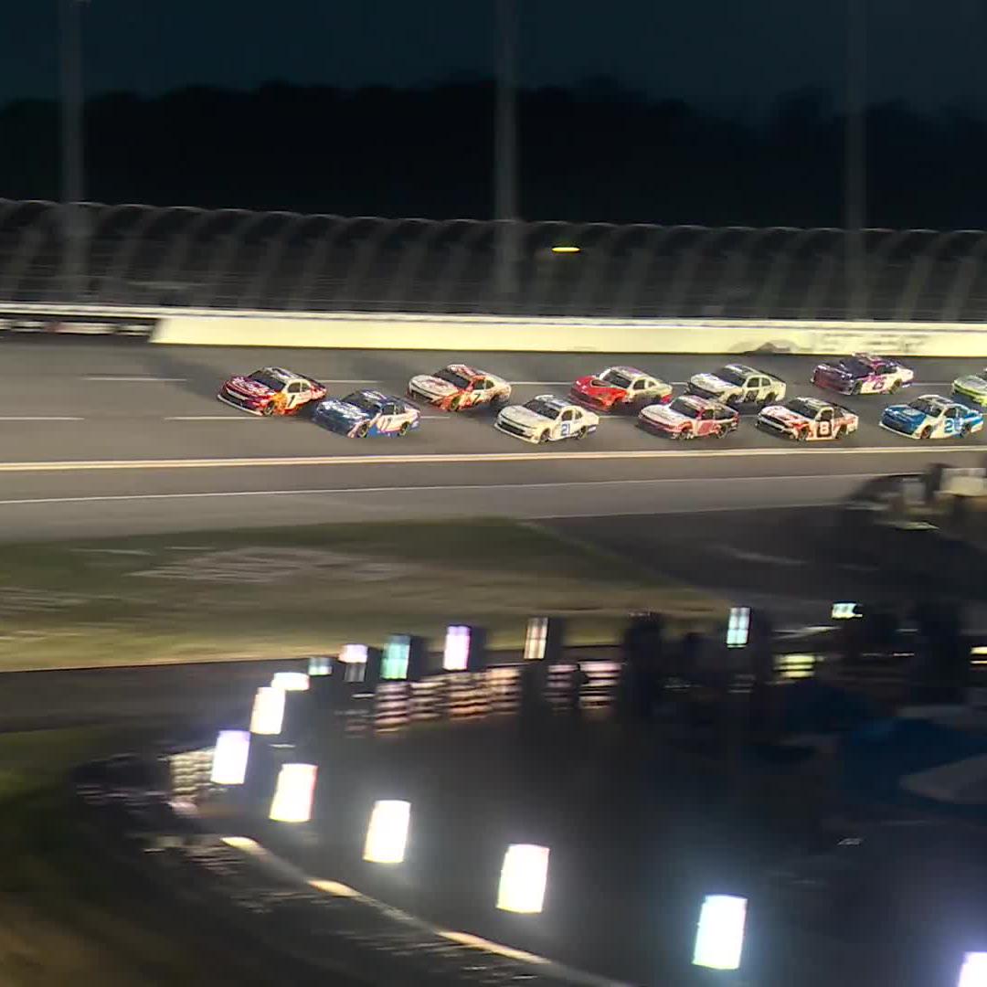 The leaders get together in front of the field!