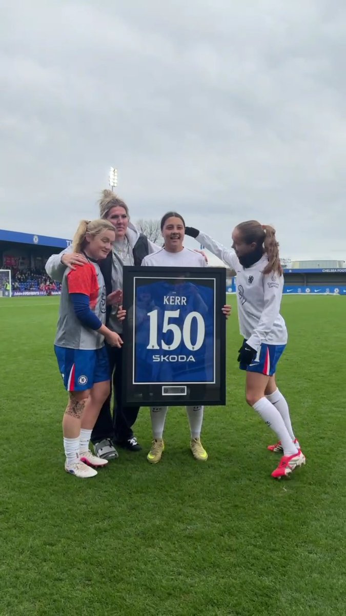 Sam Kerr is presented with a special Chelsea shirt by Millie Bright for making 150 appearances for the club 👕💙