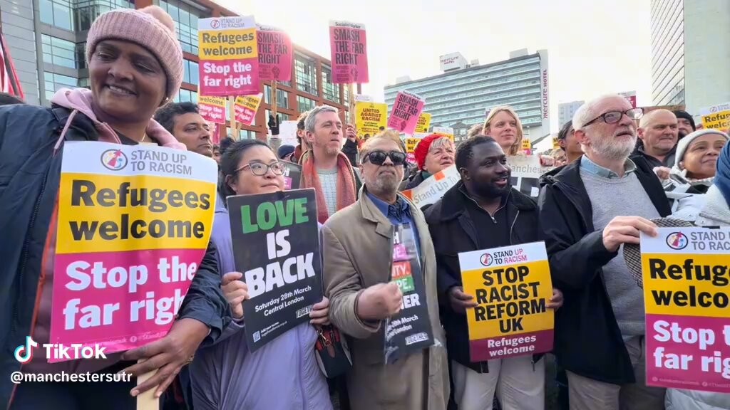 Why is Hazel Chu in Manchester chanting refugees are welcome here?