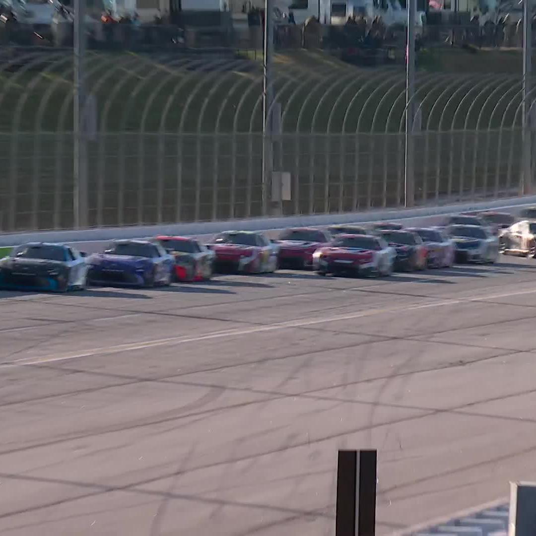 .Kyle Busch gets turned into the inside wall to bring out the fourth caution of the day.