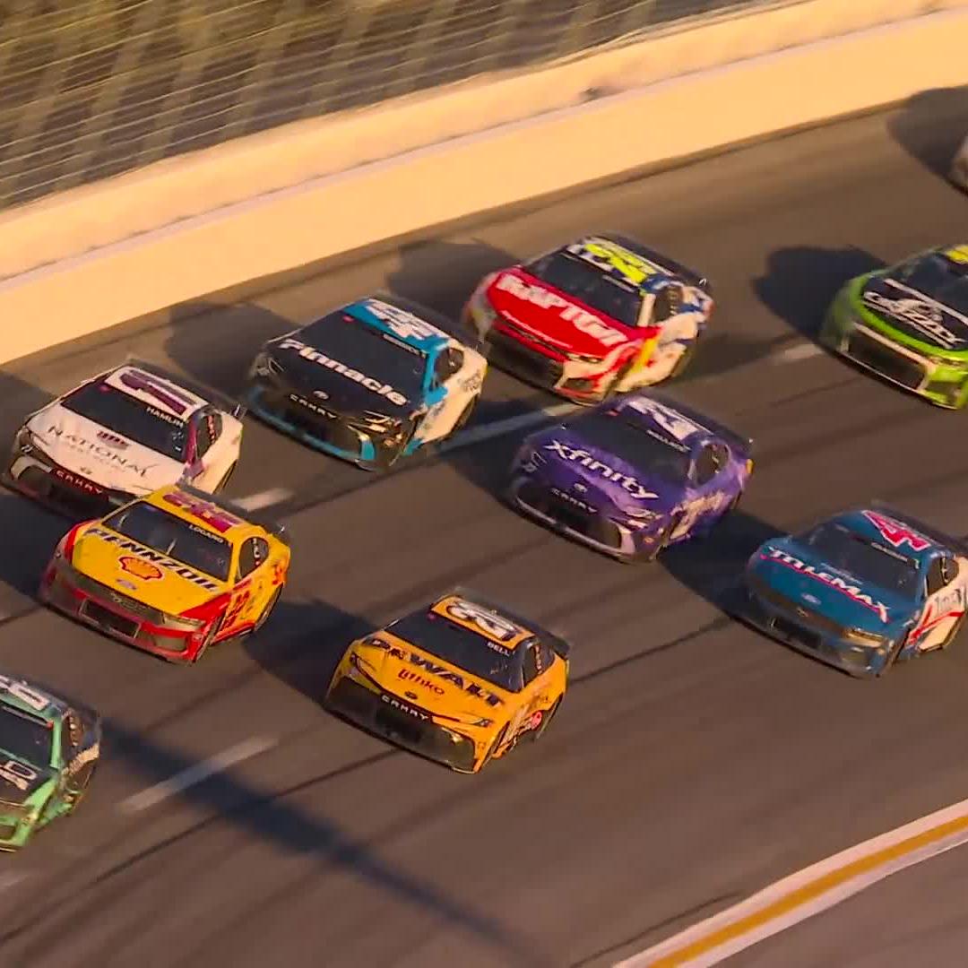 Contact coming off of Turn 4! Denny Hamlin slides down the frontstretch, and several cars get caught up behind him.