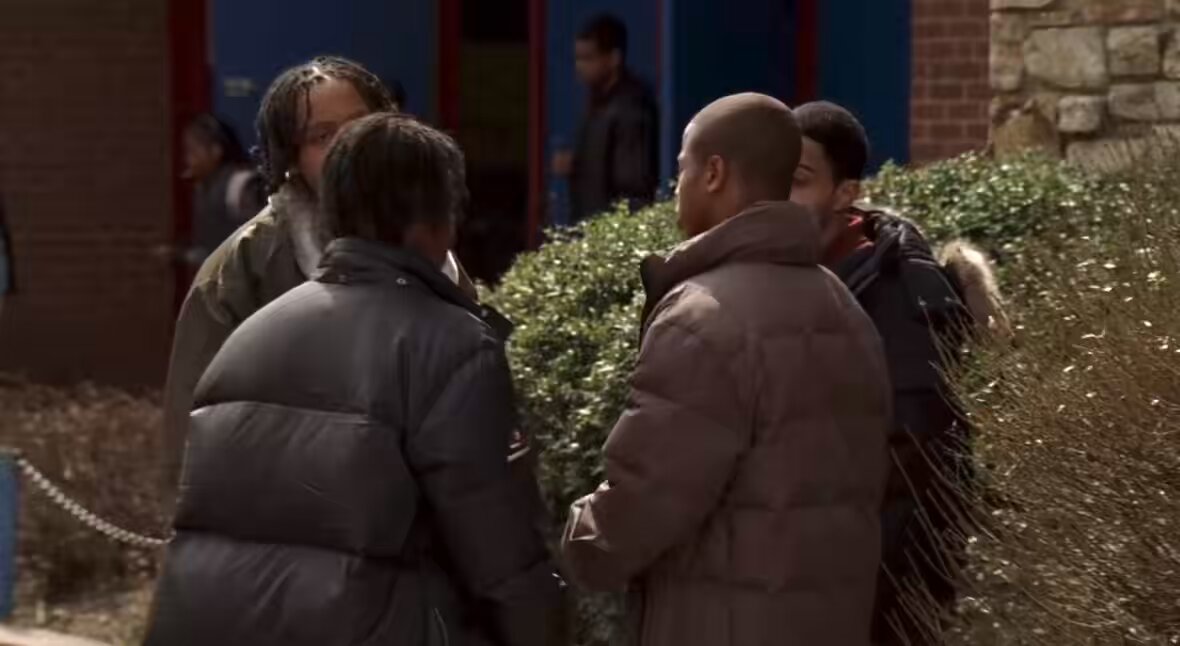 The kid in the brown jacket that says “Yo, the little bitch was talking to the police.” was boxer Angelo Ward, the 2006 Golden Glove Regional Champ. He was a close friend and mentor to Gervonta Davis. Ward was murdered in 2012.