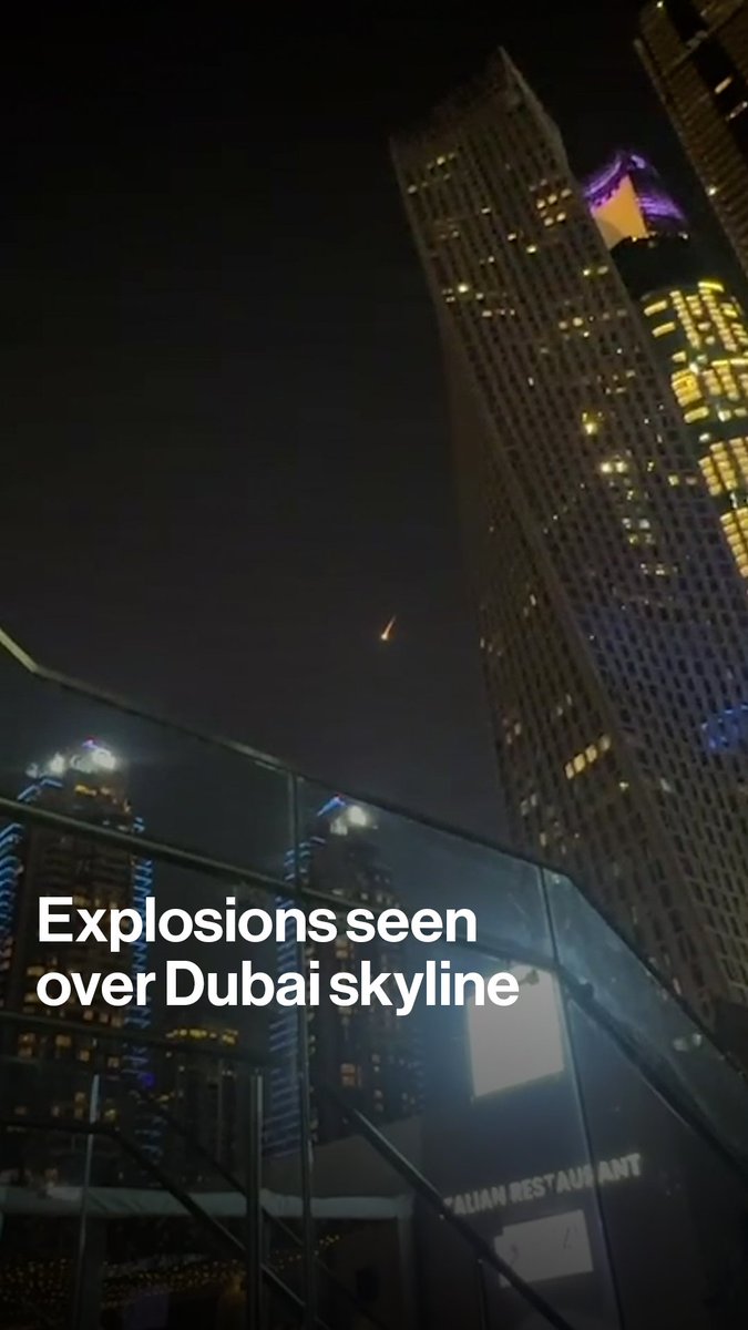 An unidentified projectile streaks across the sky over Dubai Marina on Feb. 28 as the Iran-US-Israel conflict intensifies across the Gulf