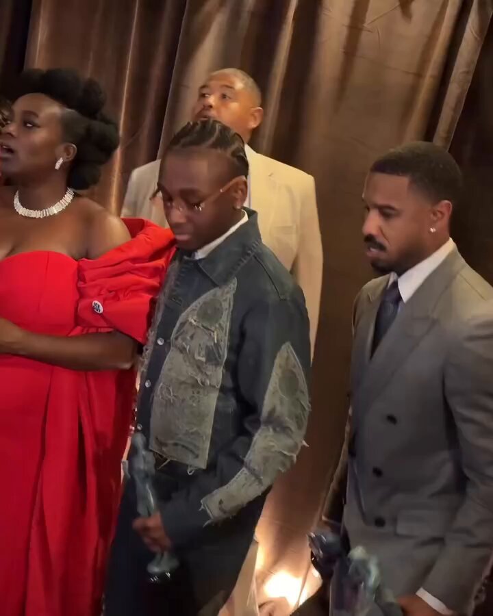 Someone yelling out “fellowship and love yall” while Michael B. Jordan, Jack O'Connell, Wunmi Mosaku, Jayme Lawson, Omar Benson Miller, Li Jun Li, Delroy Lindo, Lola Kirke, &amp; Miles Caton pose with their Actor Awards for Sinners😭