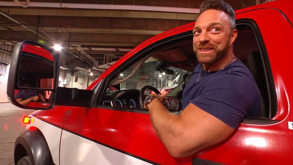 .LA Knight is DRIVING the ambulance holding Paul Heyman! 🤯 PURE CHAOS!