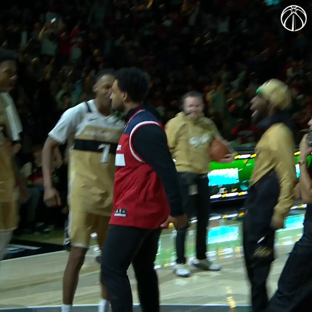 Buries a $10K half-court shot and goes straight to his team’s bench. That’s a fan